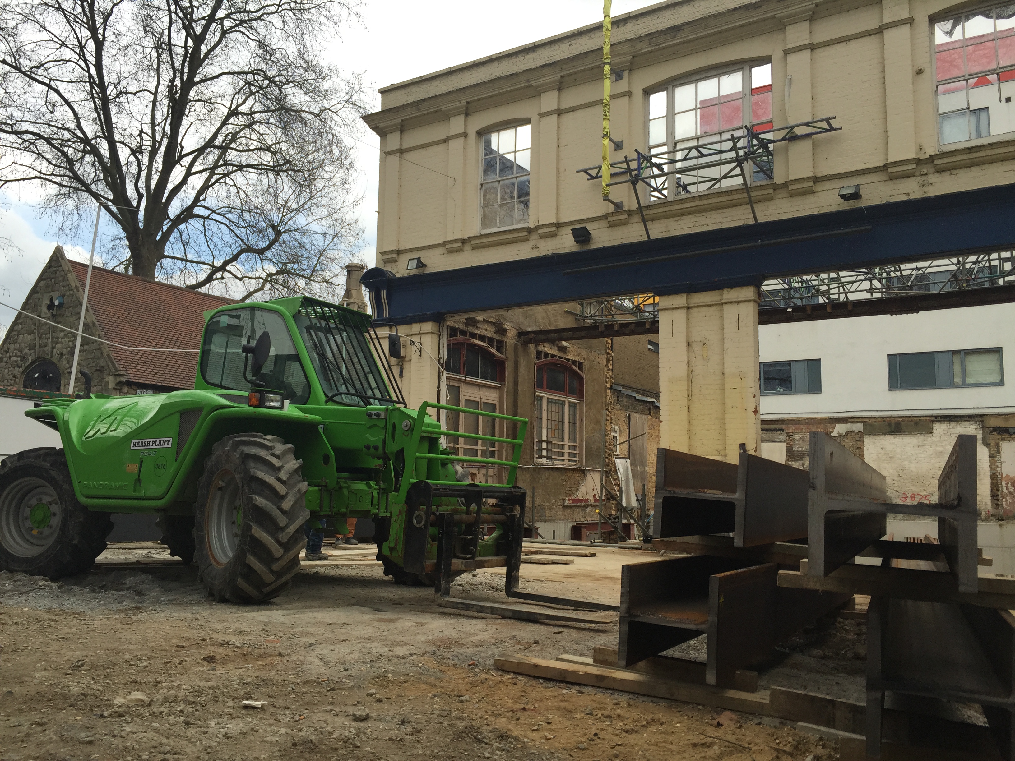 Transfer beam installation telehandler